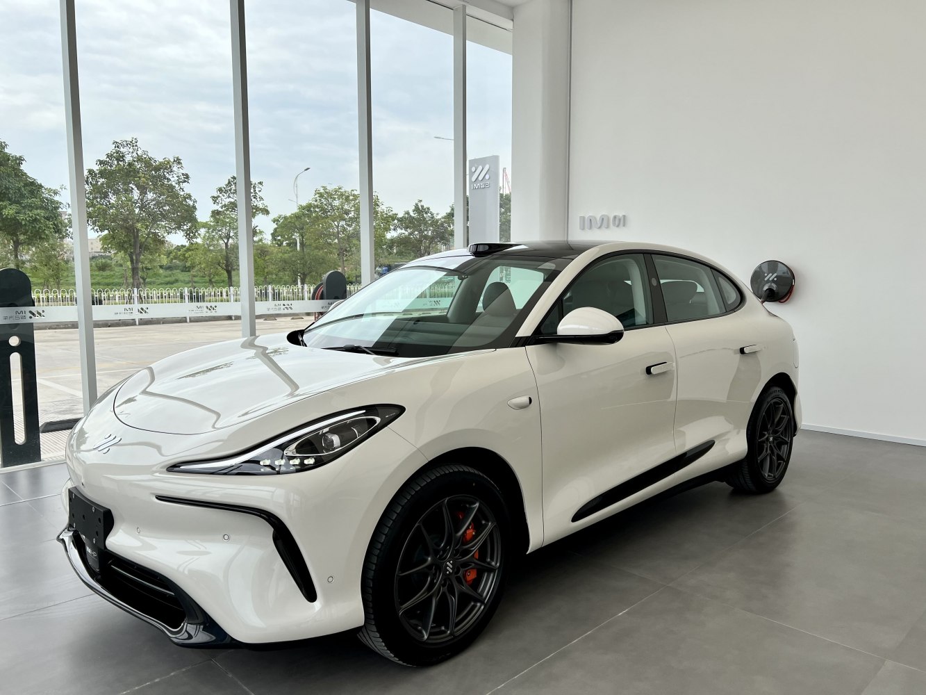 Electric hatchback with aerodynamic body and LED headlights
