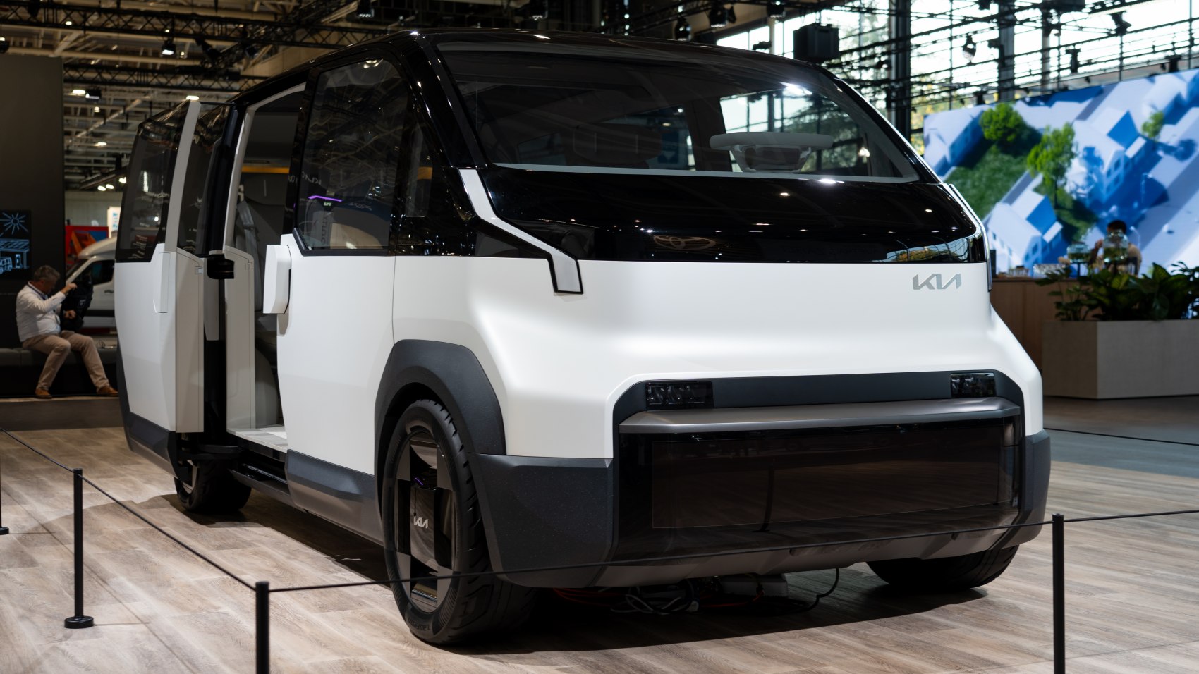 Electric minivan with sliding doors and two-tone futuristic design