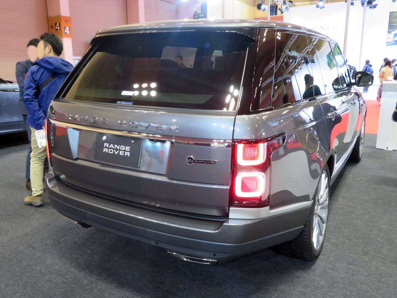 Luxury SUV rear with distinctive LED tail lights and long-body styling