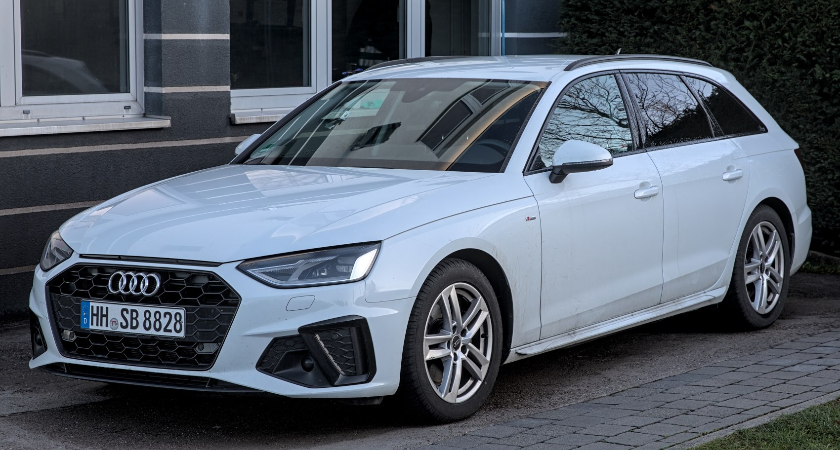 White 2020 station wagon with hexagonal grille and alloy wheels