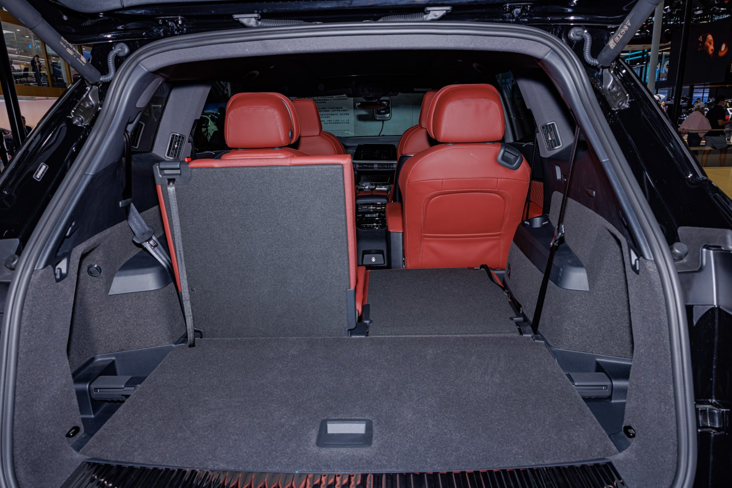 Cargo area and split fold-down rear seats with red leather upholstery