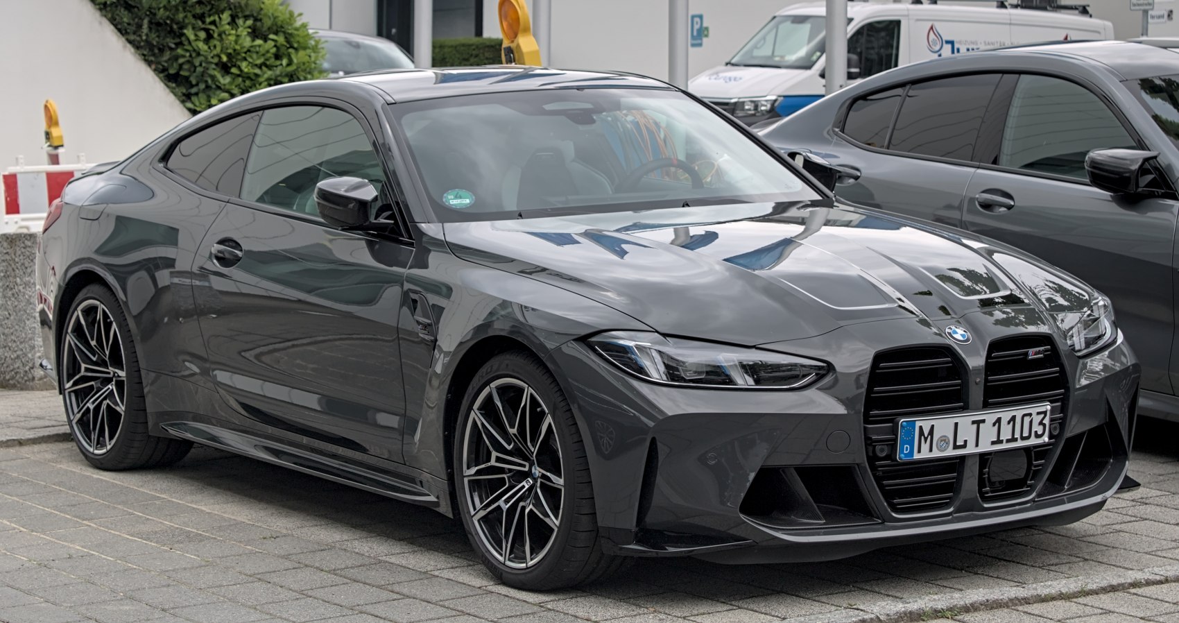 Sporty coupe with aggressive kidney grille and aerodynamic black exterior