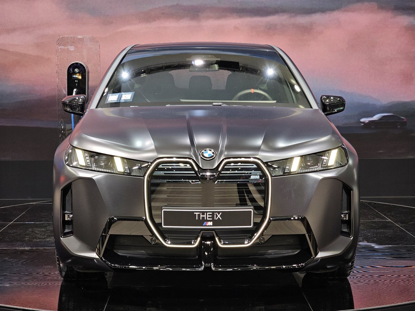 Front view with large kidney grille and LED headlights