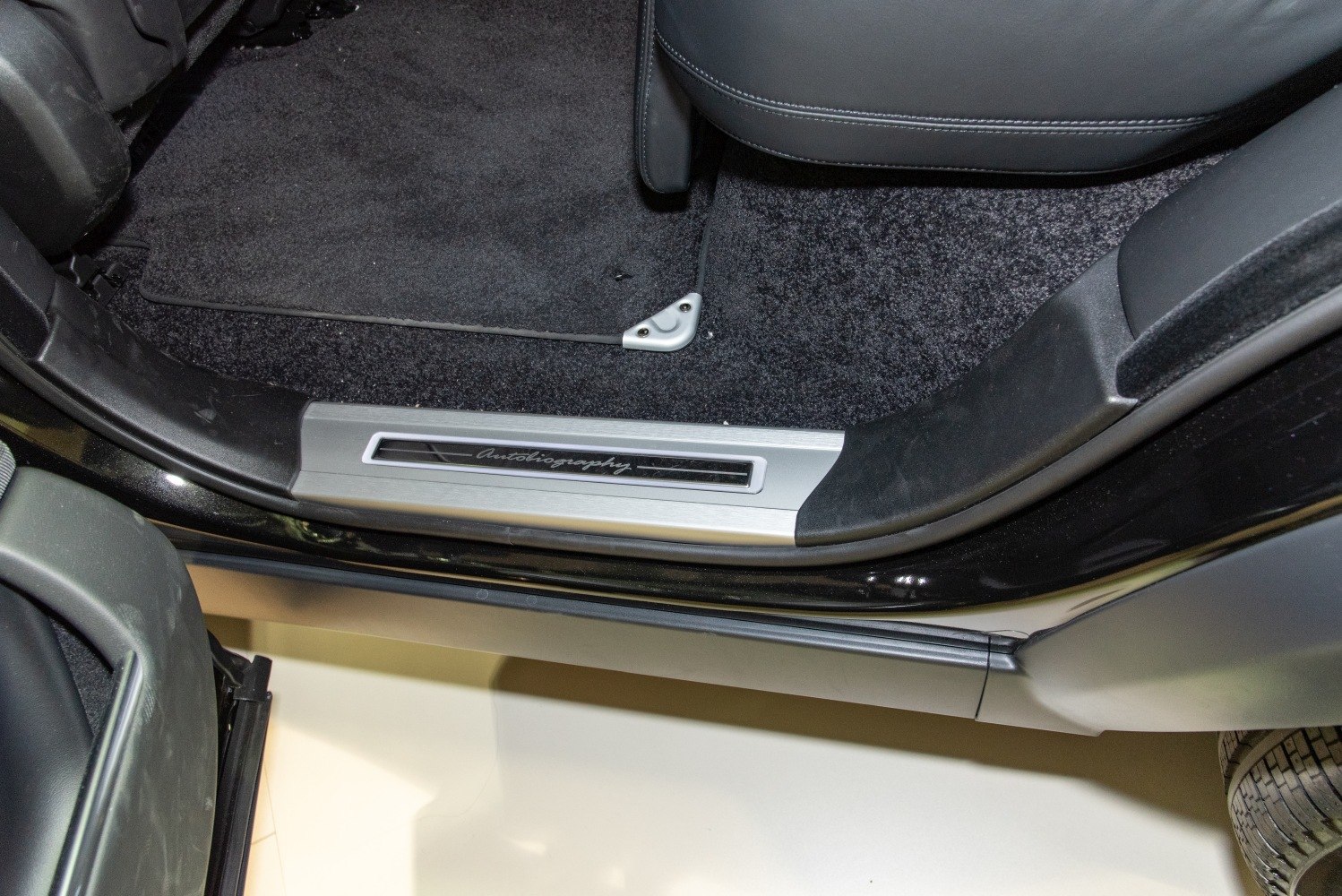 Luxury Autobiography door sill and floor mat interior trim