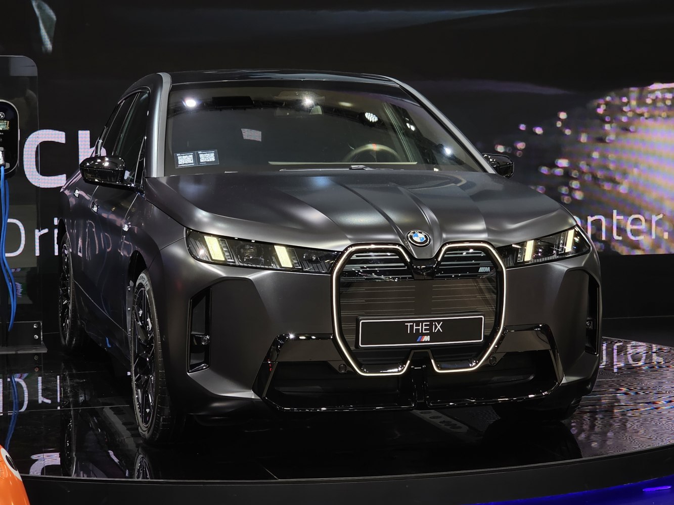 Front view with LED headlights and large kidney grille