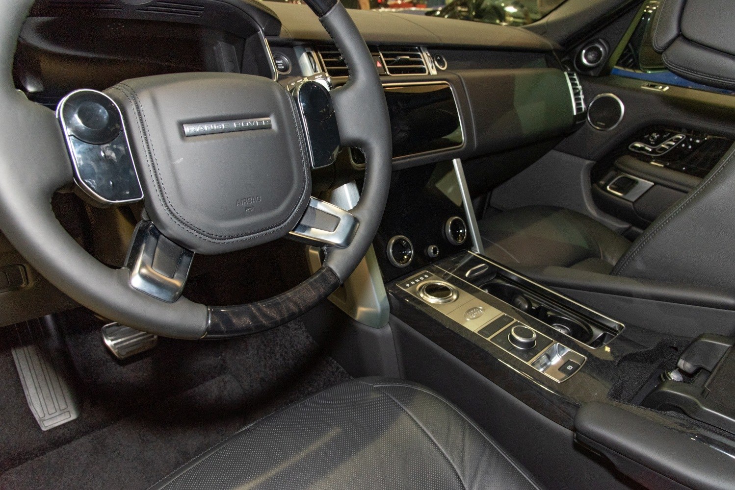 Steering wheel and center console with digital controls and luxury finish