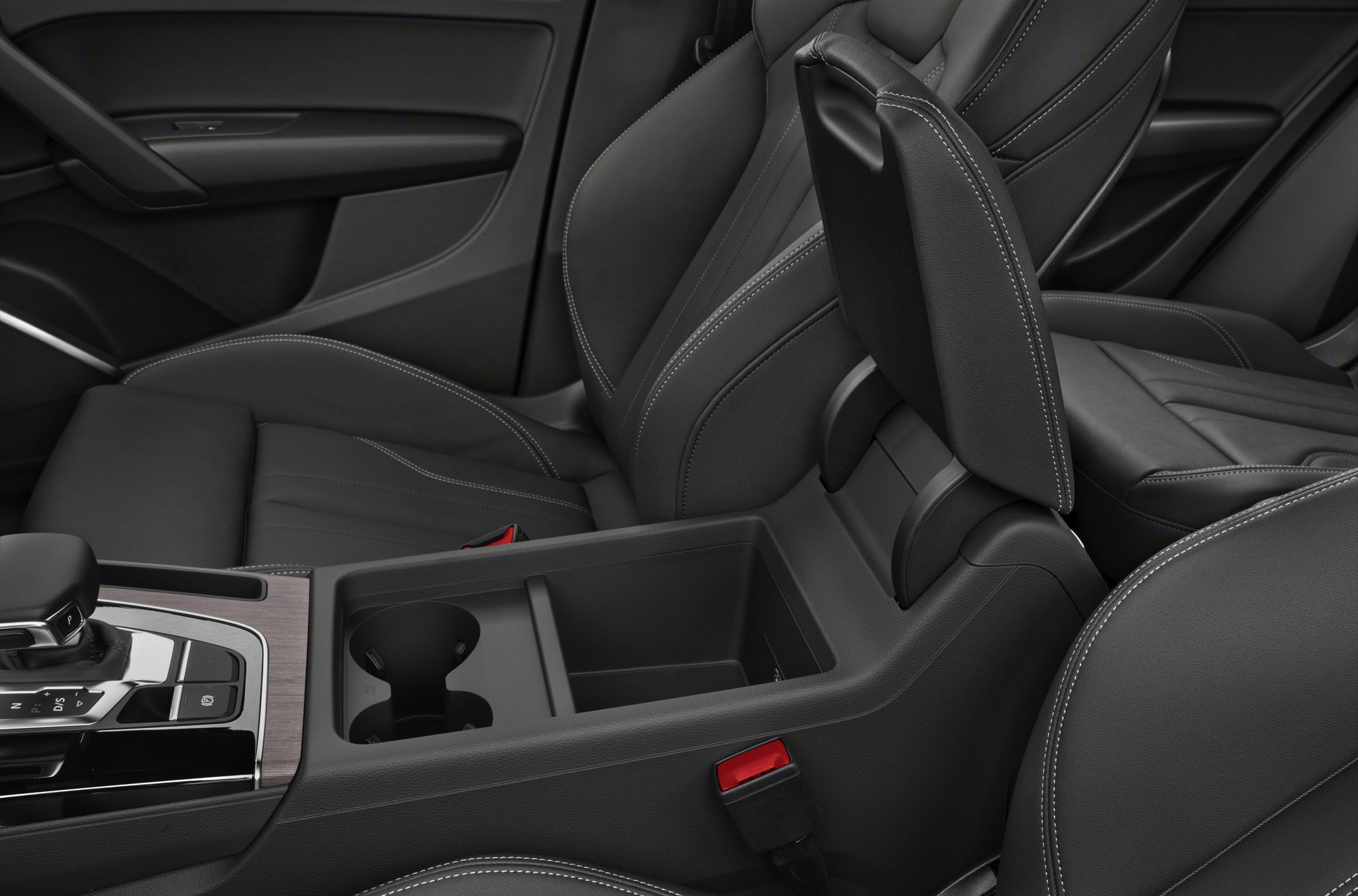 Center console with gear selector and cup holders