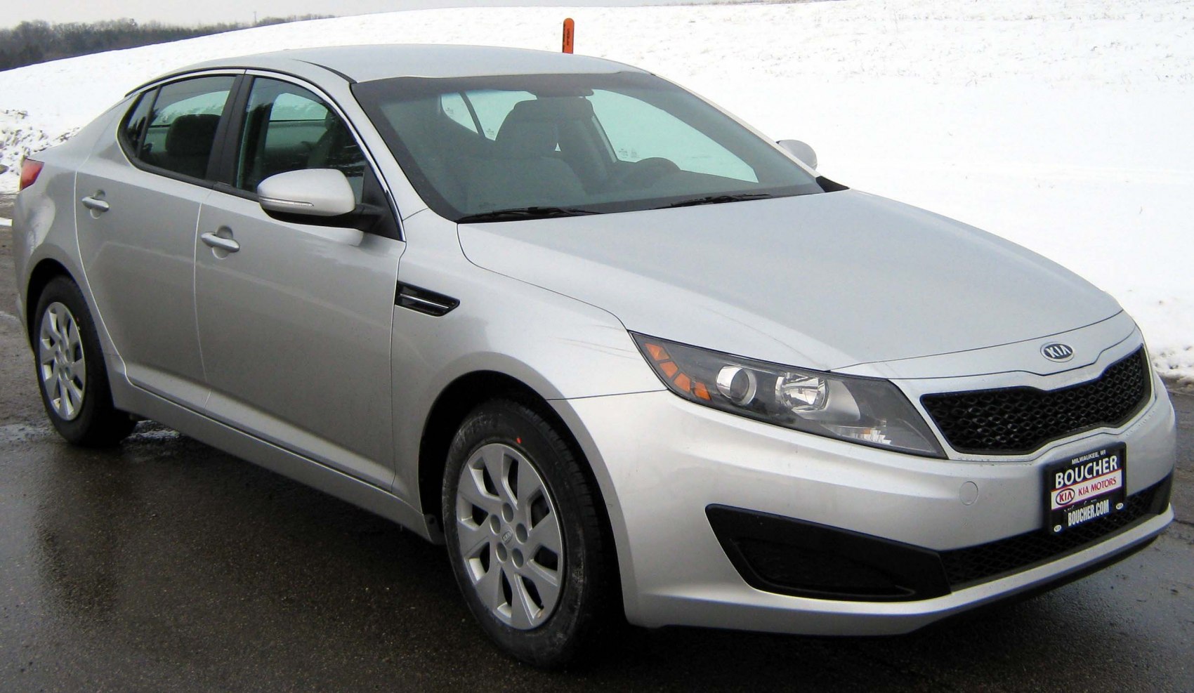 Front side view with sharp headlights and sleek design