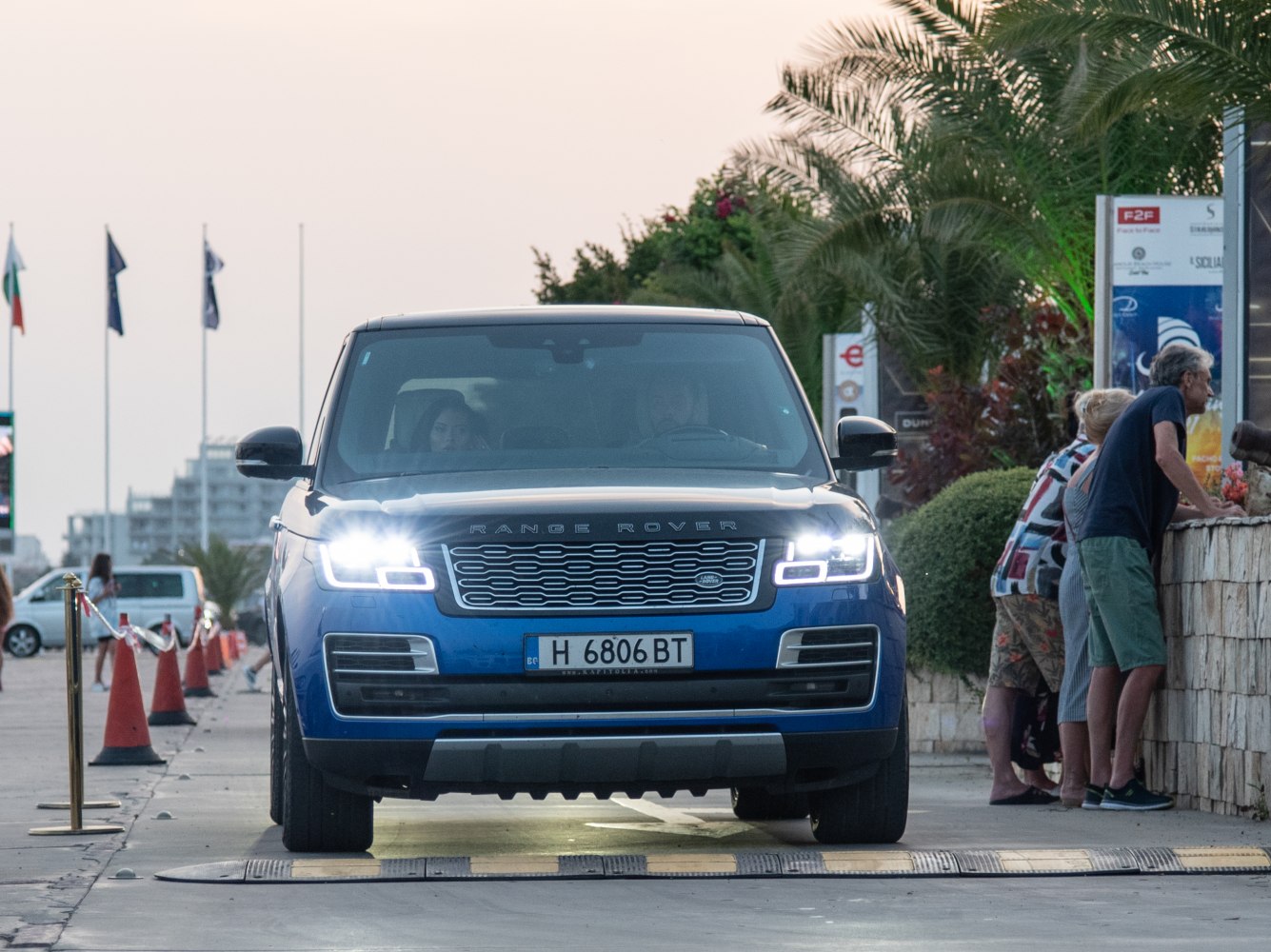 Front view with LED headlights and signature grille