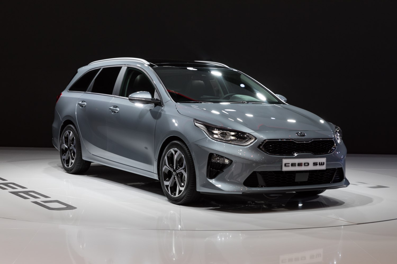 Front and side profile with headlights and alloy wheels