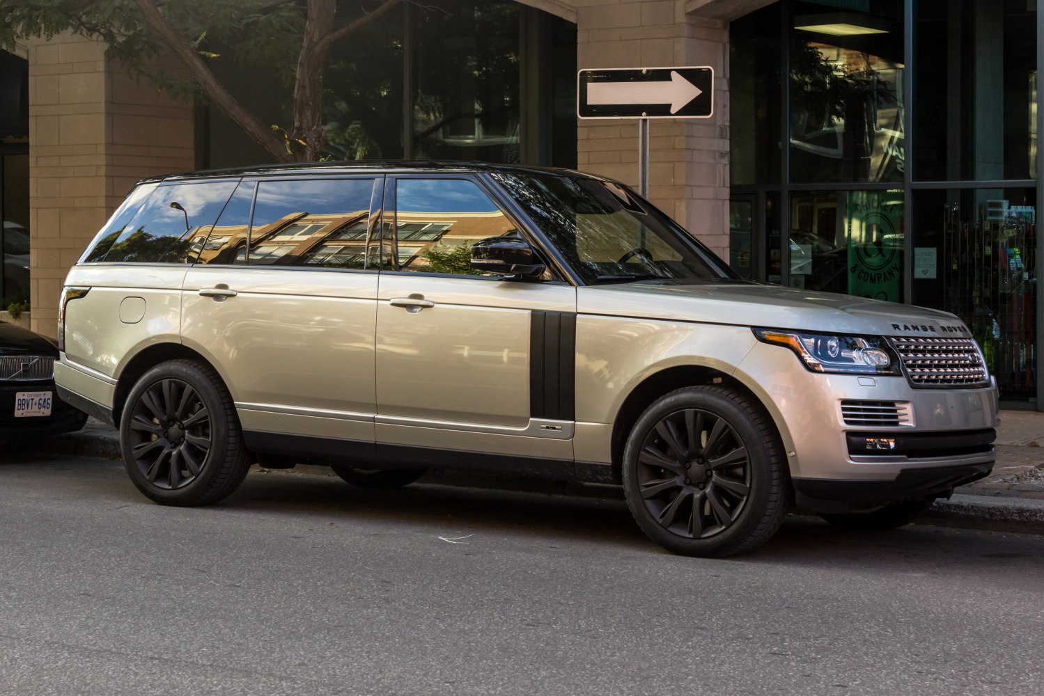 Luxury SUV with black alloy wheels and long wheelbase body design