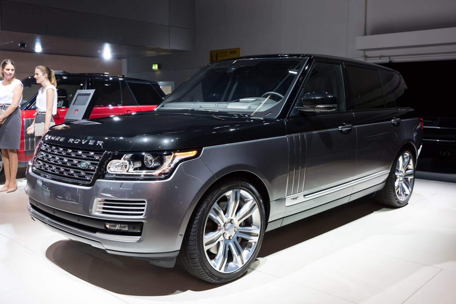 Front side view luxury SUV with sleek headlight and grille