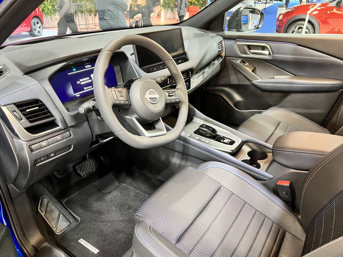 Digital dashboard and ergonomic steering wheel in modern car interior