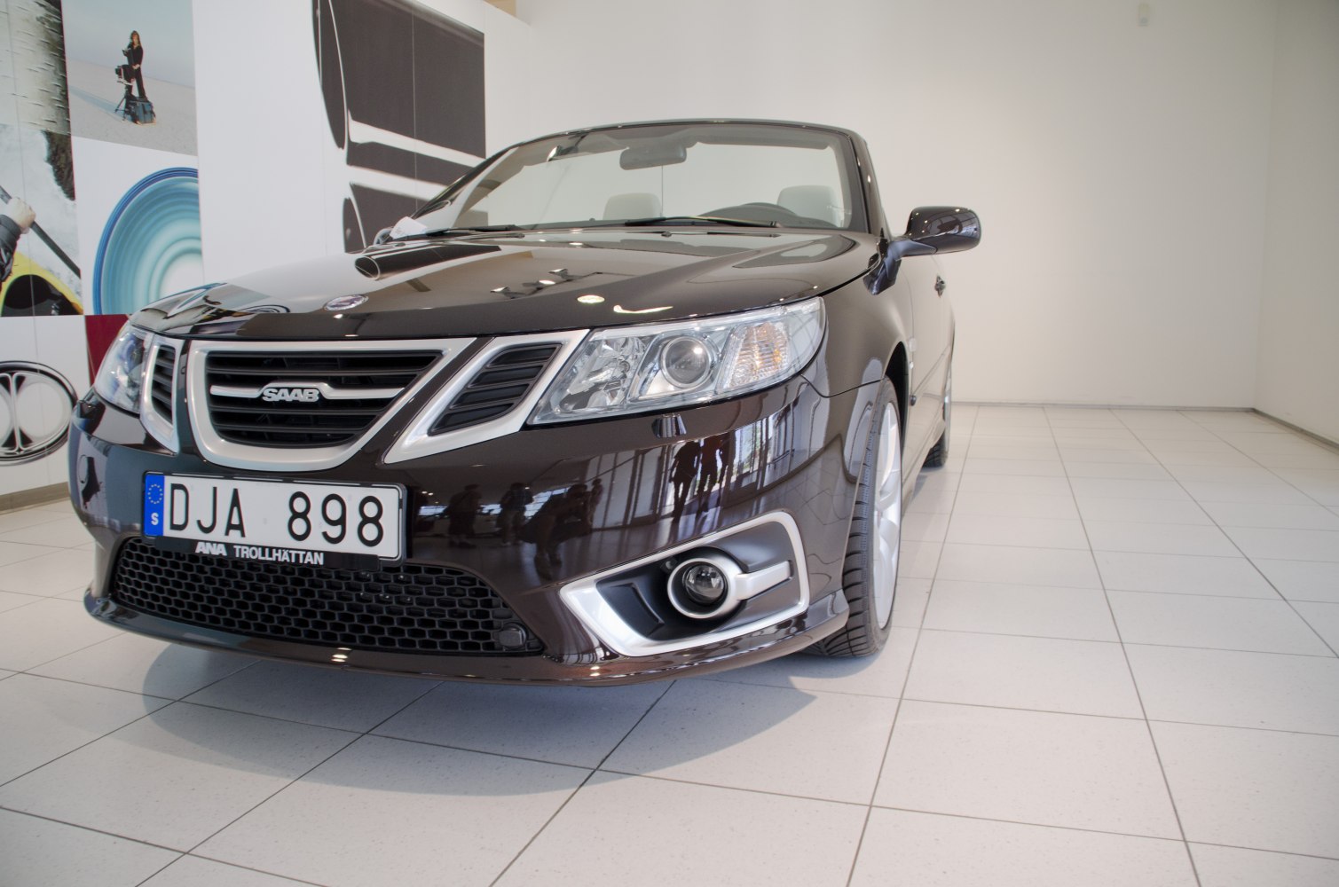 Front end with headlights, fog lights, and grille
