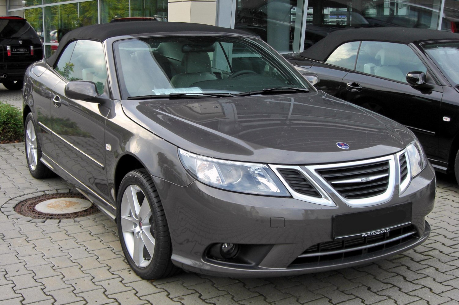 Front view of convertible with alloy wheels and sharp headlights
