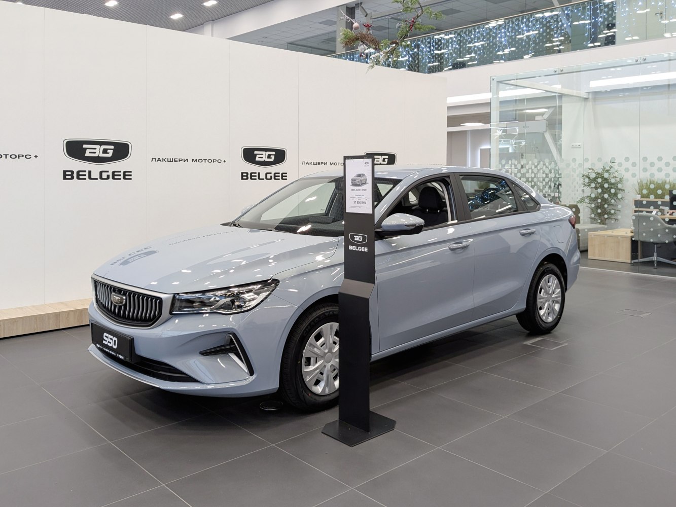 Compact sedan with distinctive grille and headlights