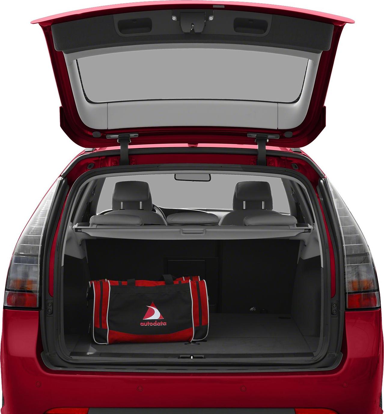 Open trunk of a red hatchback highlighting spacious cargo area and rear seats