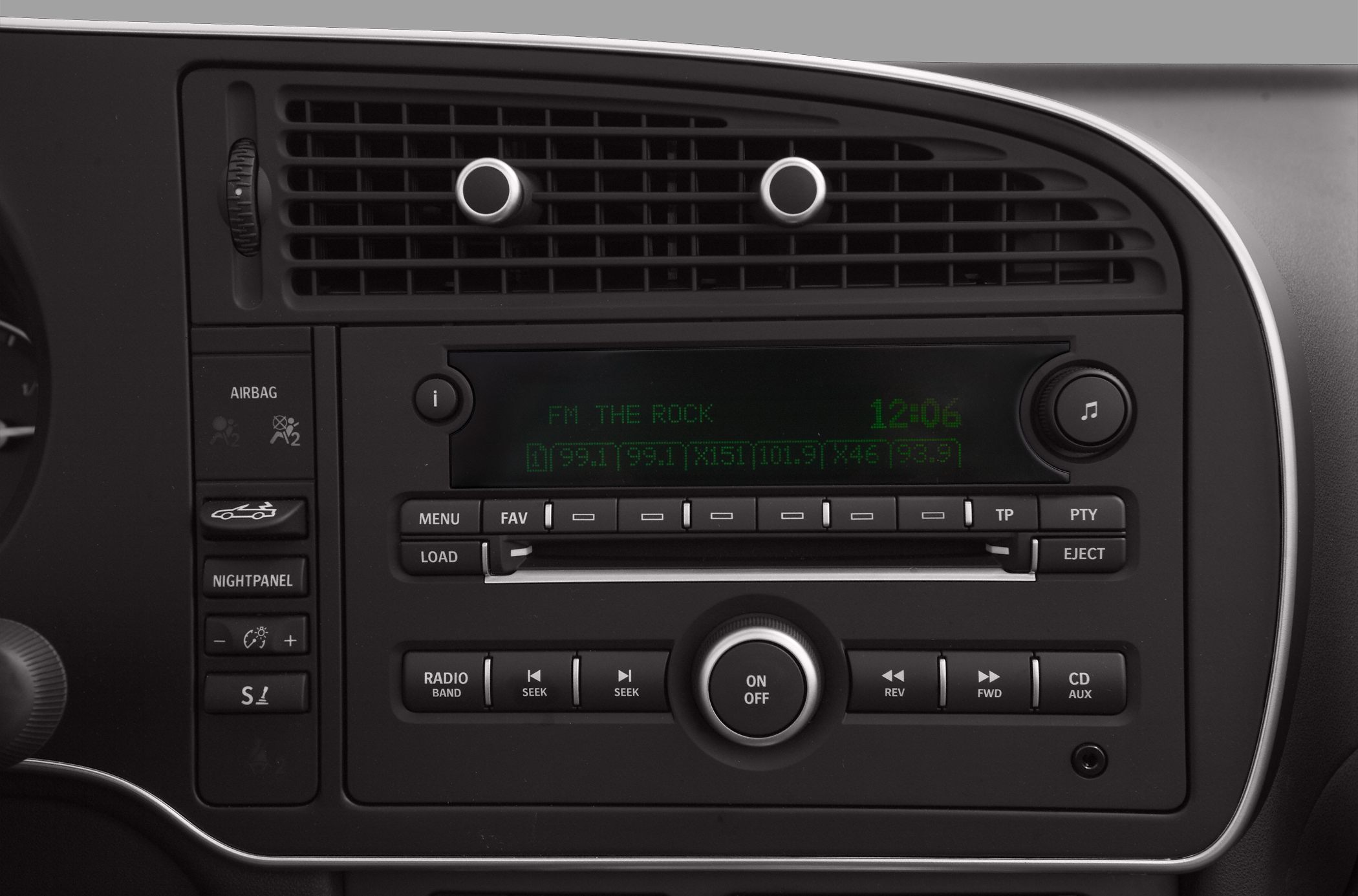 Classic car stereo dashboard with radio and CD controls.