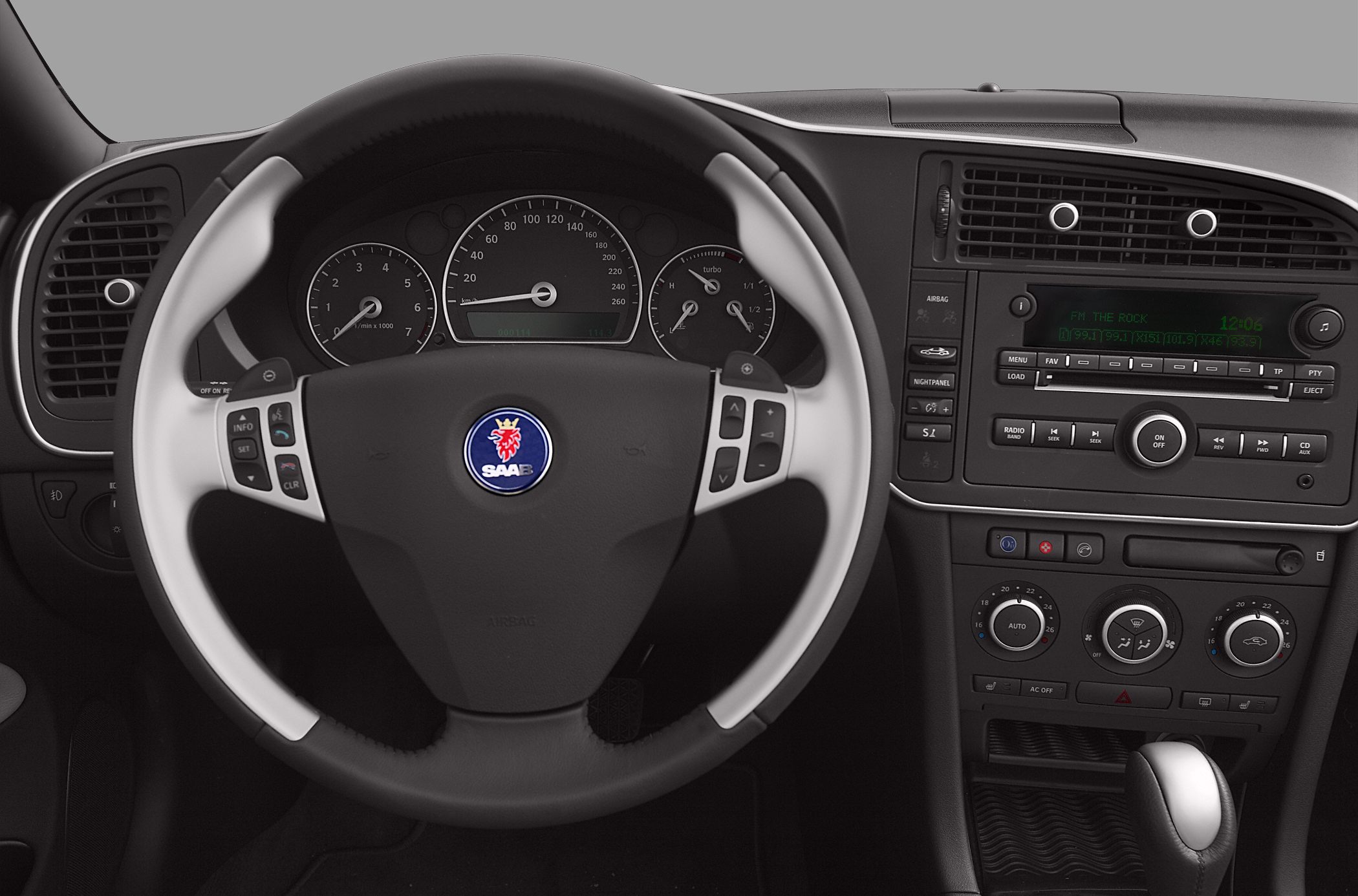 Car steering wheel with instrument cluster and center console controls