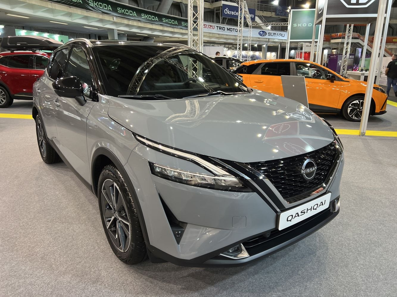 Front view of modern SUV with LED headlights and sporty grille