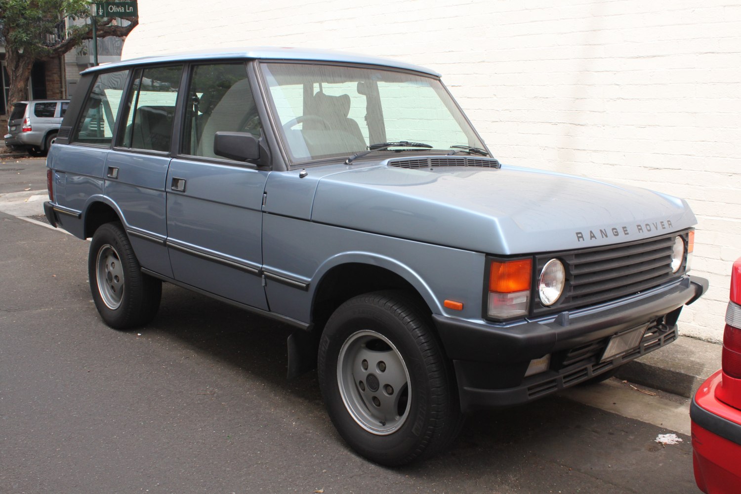 Classic 1980s SUV with front grille and boxy shape