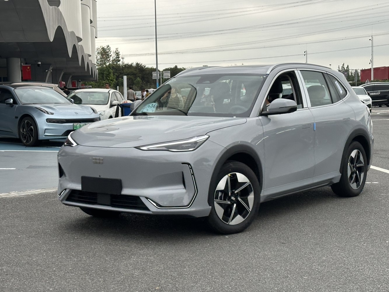 Electric SUV with sleek LED headlights and unique alloy wheels