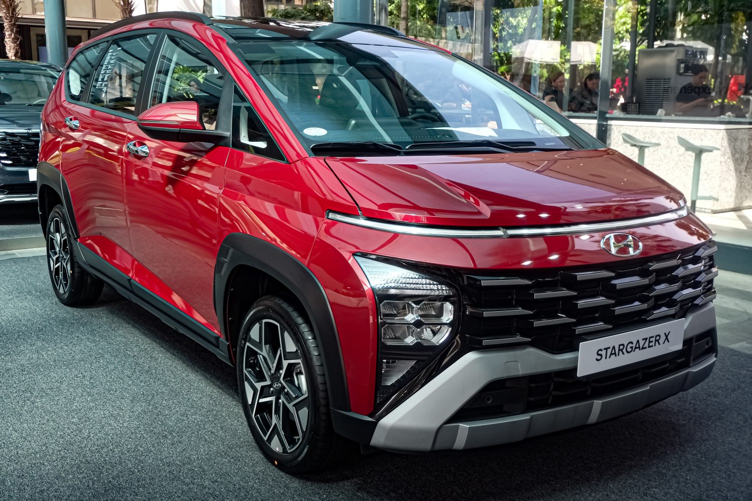 Front close-up with LED headlights and bold grille