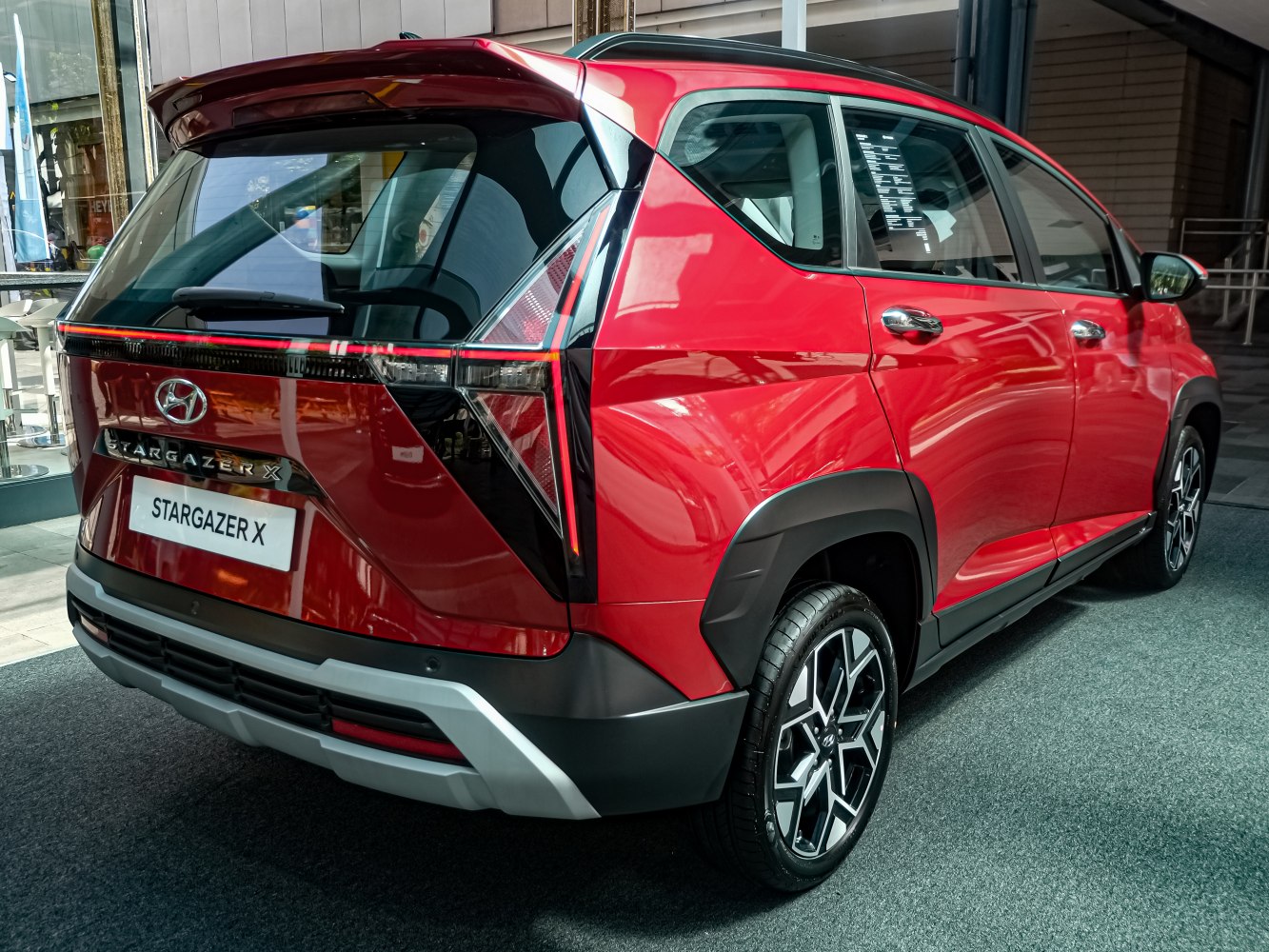 SUV rear design with unique taillights and alloy wheels