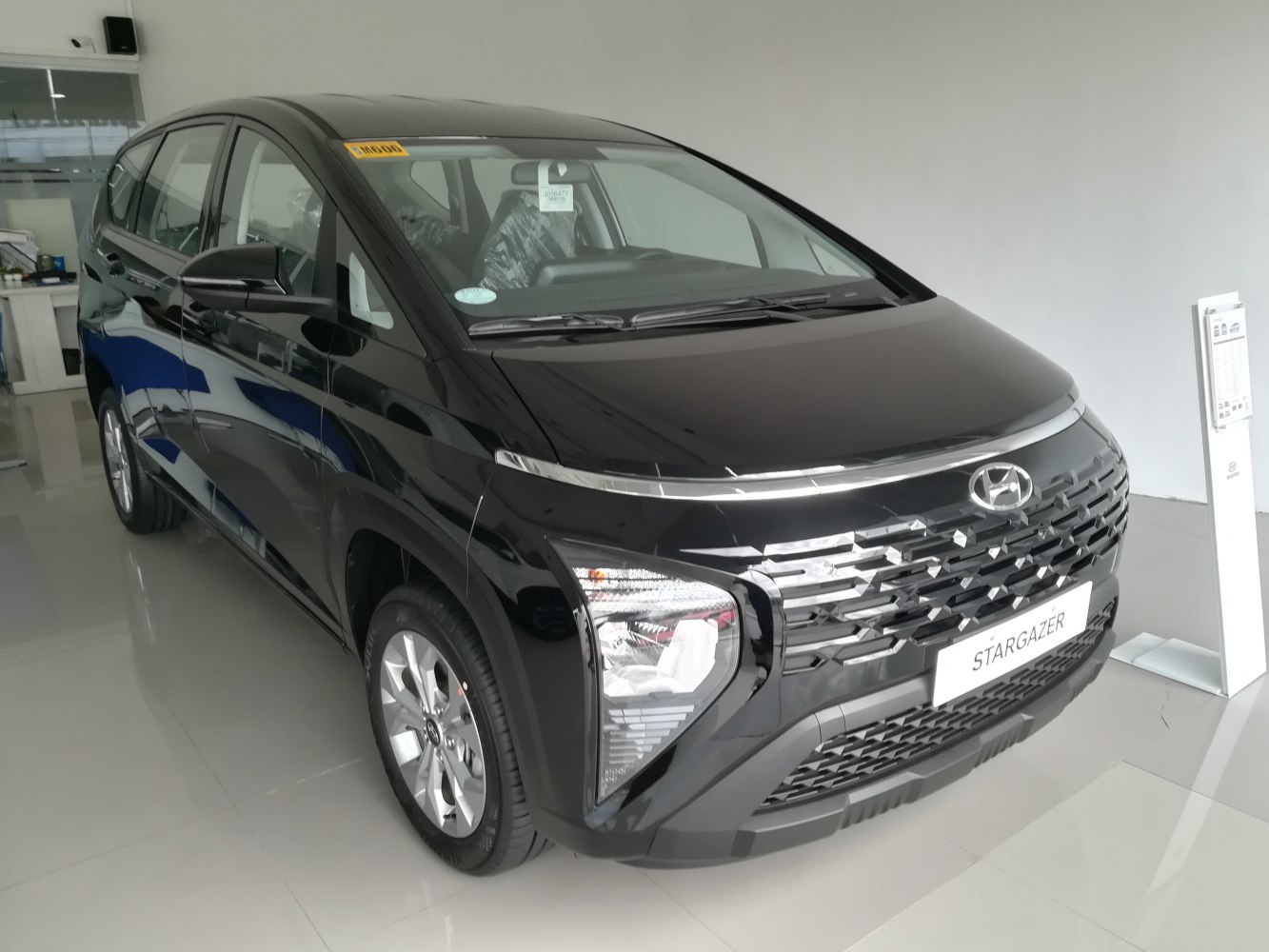 Front grille and headlight design of a sleek black SUV
