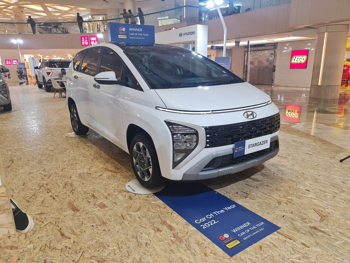 Front view of a modern MPV with distinctive grille and headlight design
