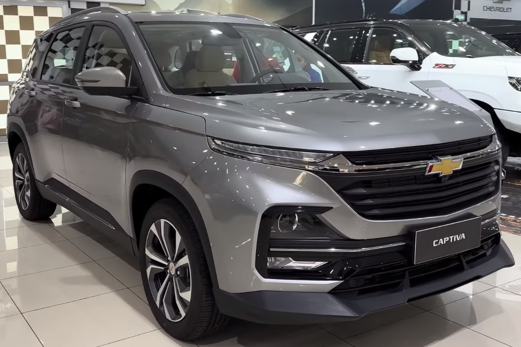 Front view showing sleek LED headlights and bold grille design