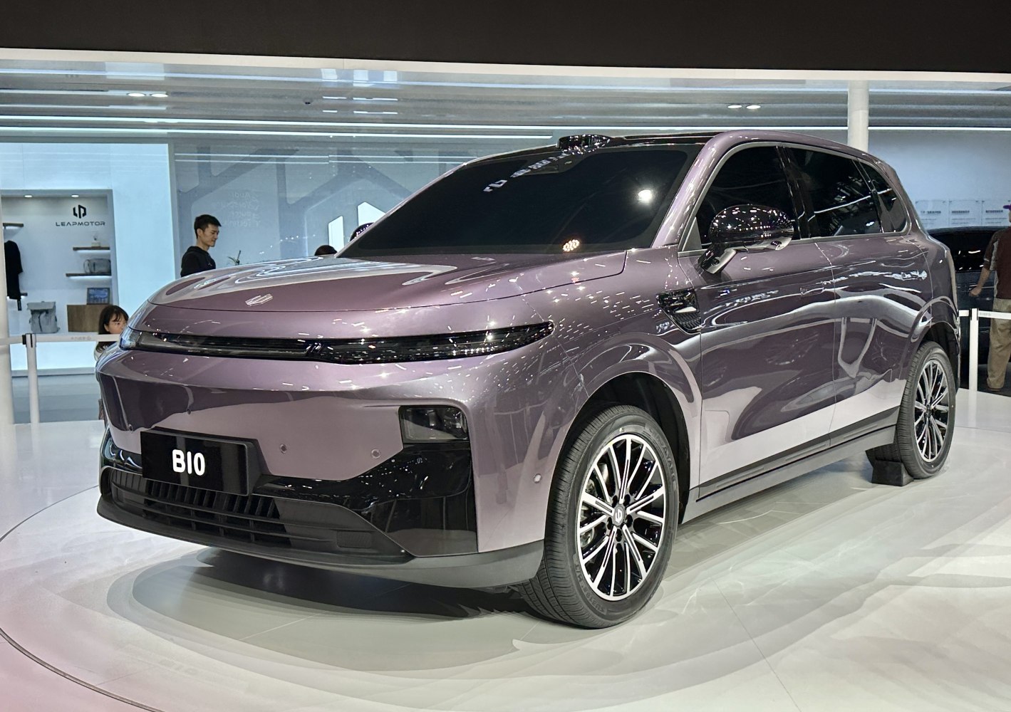 Futuristic electric SUV with sleek body and advanced LED headlights