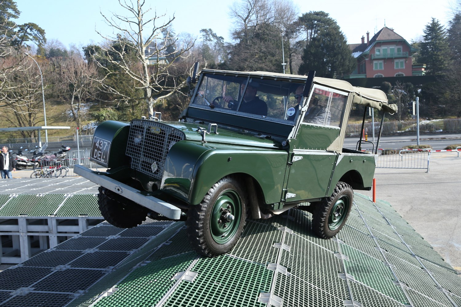 Vintage off-road SUV with classic grill and open soft top roof