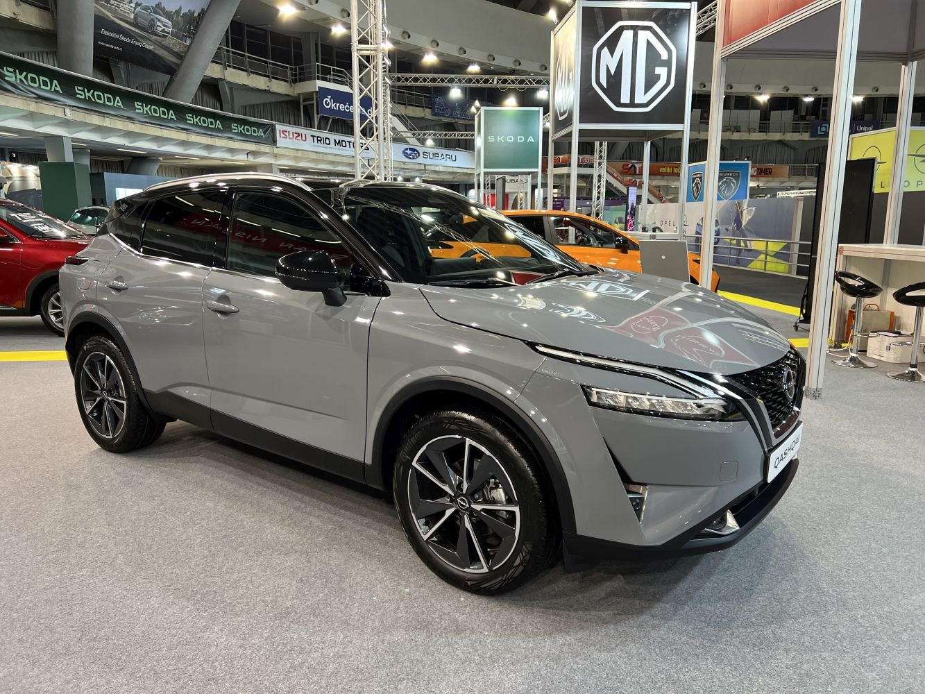 Modern SUV front side view with LED headlights and alloy wheels