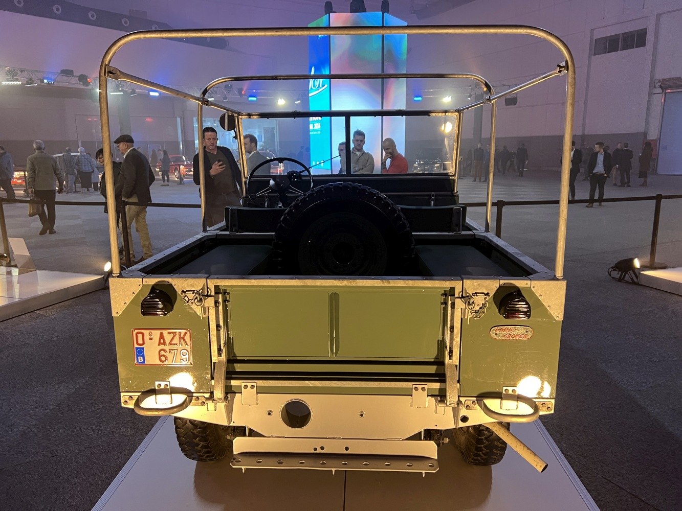 Rear cargo bed and exterior roll cage of a vintage utility vehicle