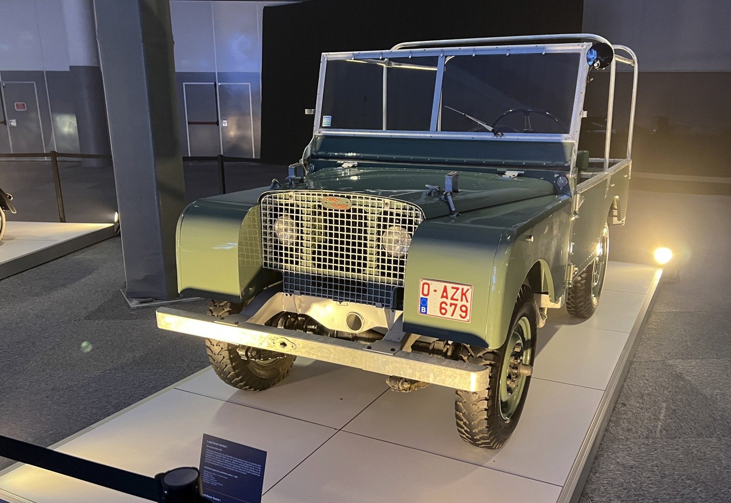 Vintage off-road utility vehicle with mesh grille and flat hood