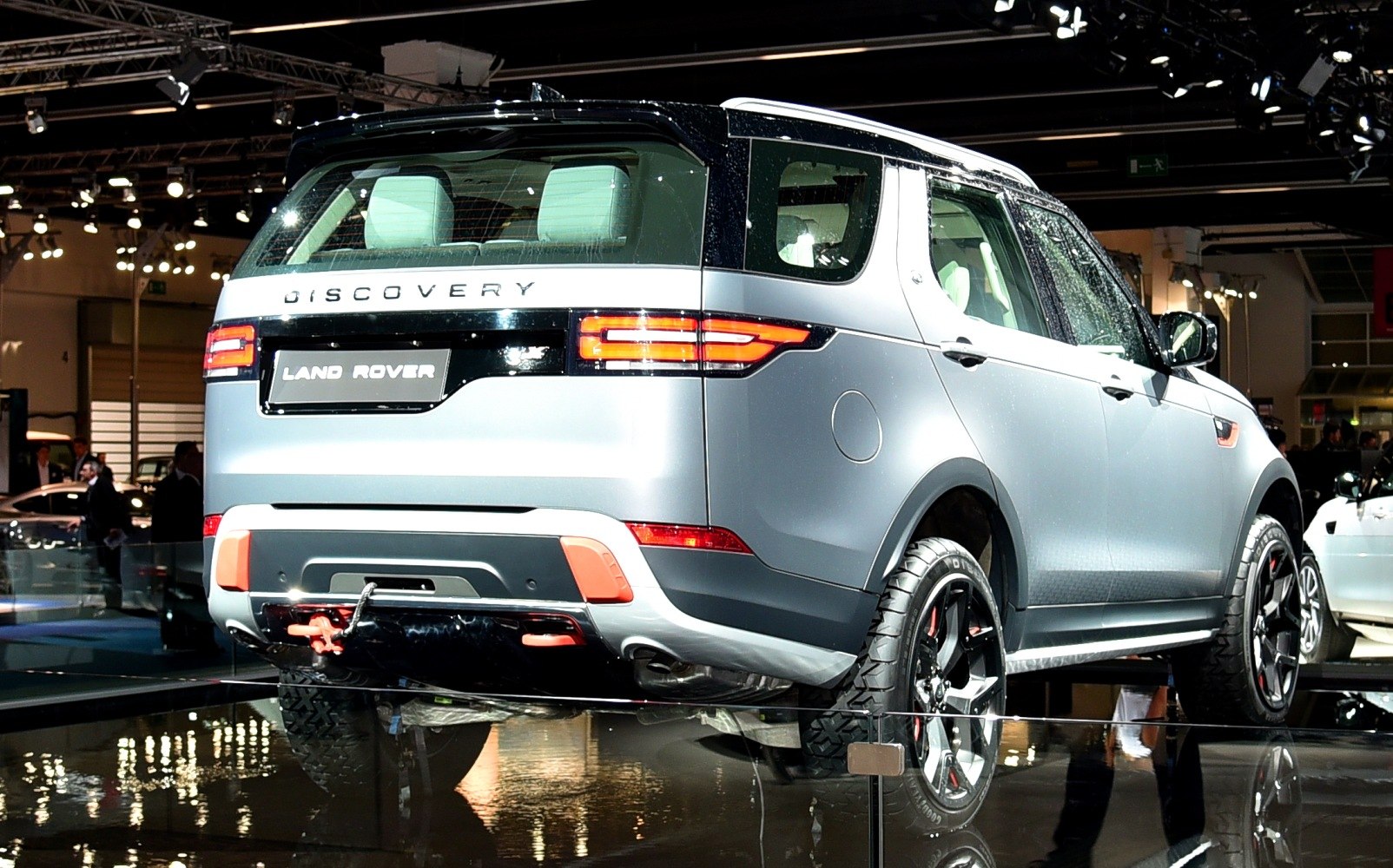 Rear SUV view with off-road tires and tail lights