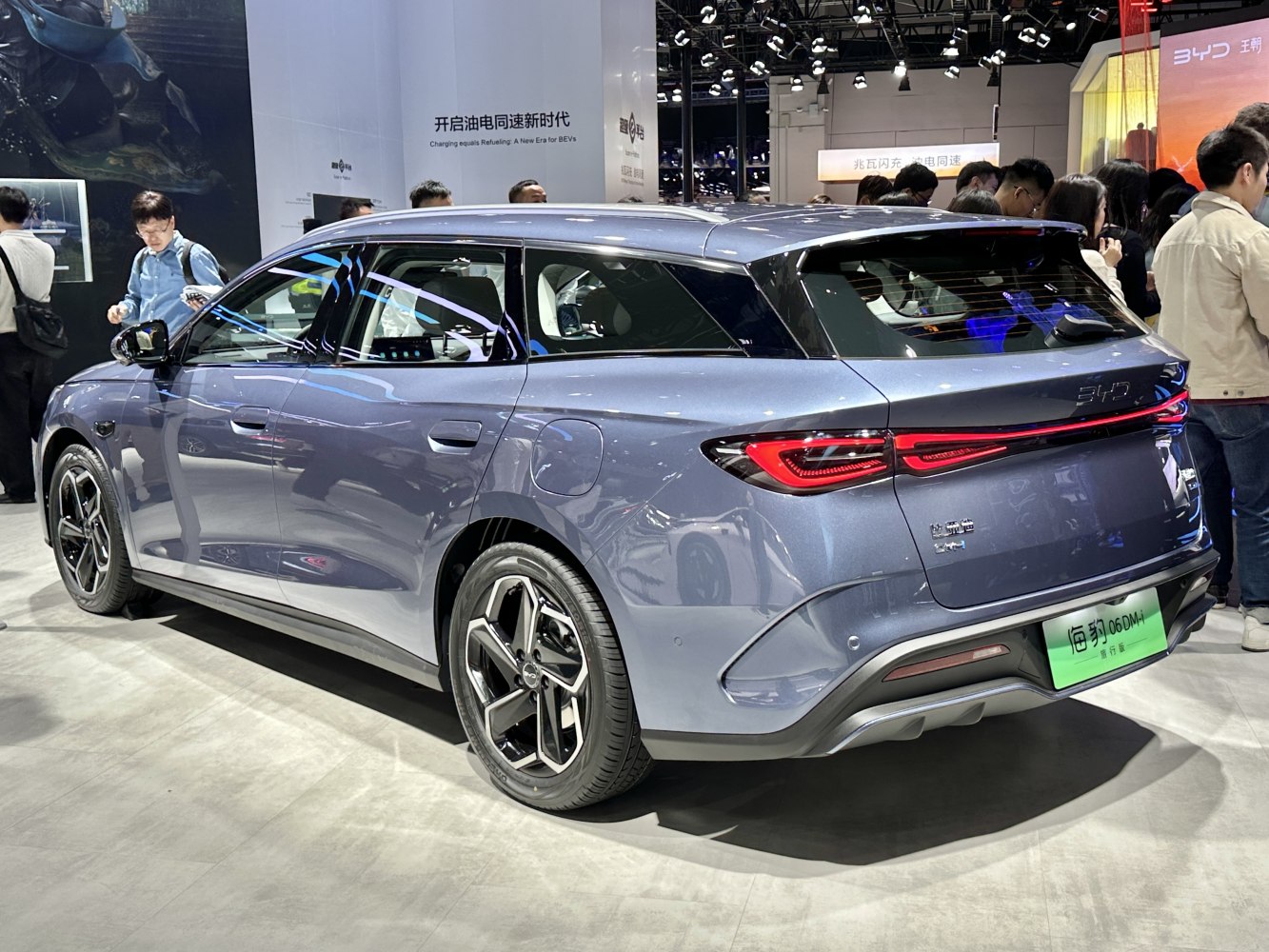 Modern station wagon rear with sleek LED tail lights and aerodynamic styling.