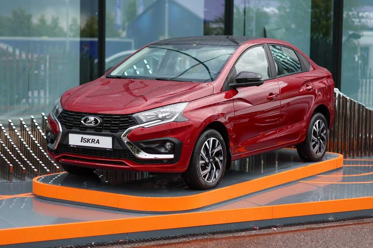 Front side view with angular LED headlights and alloy wheels