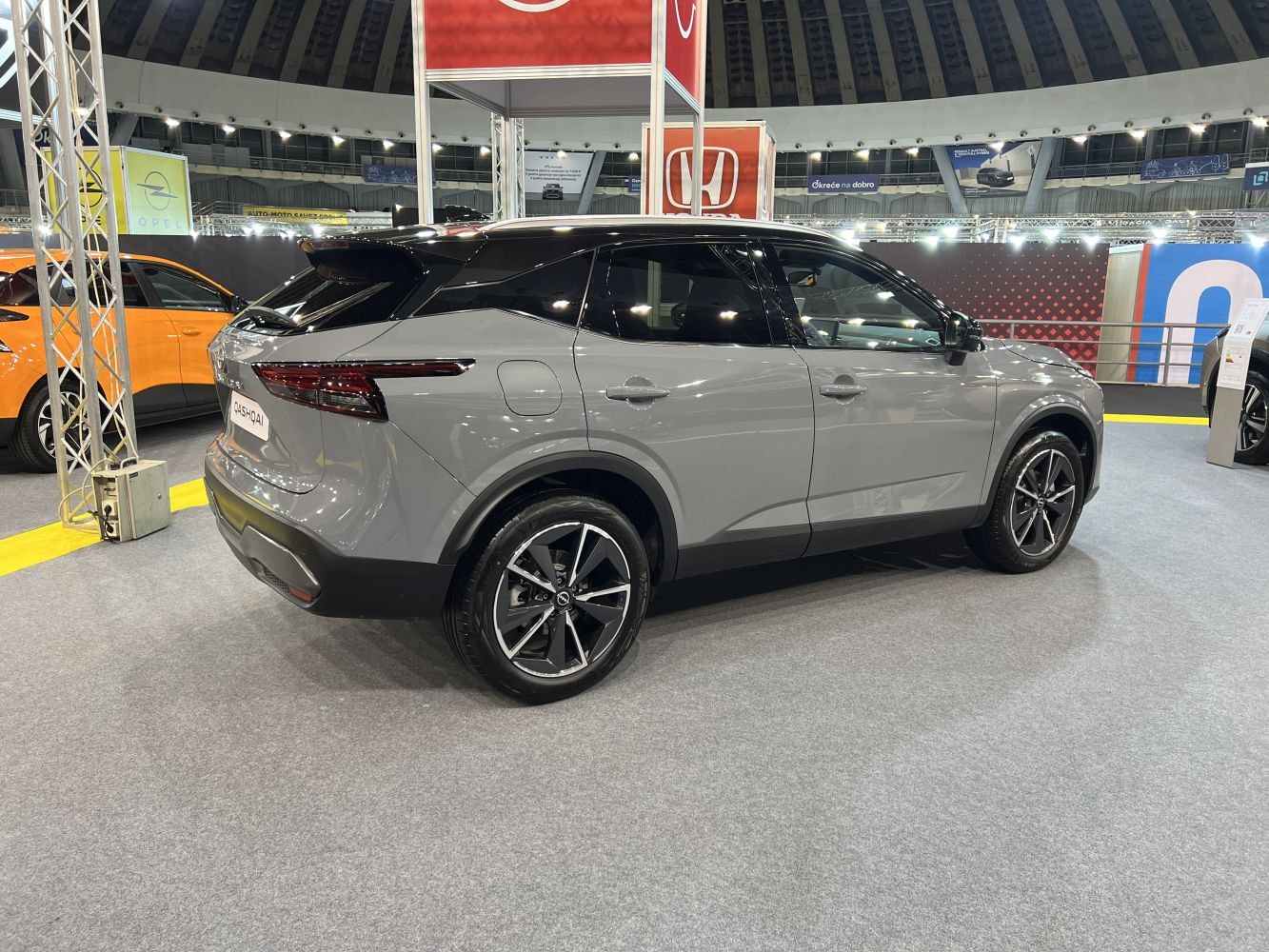 Rear and side view of a modern compact SUV with alloy wheels