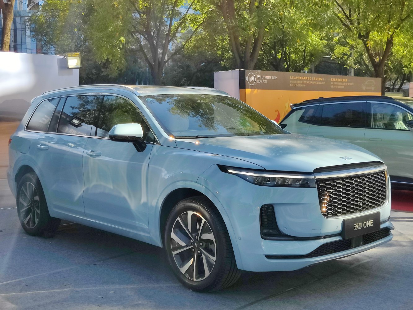 Front grille and LED headlights of modern SUV