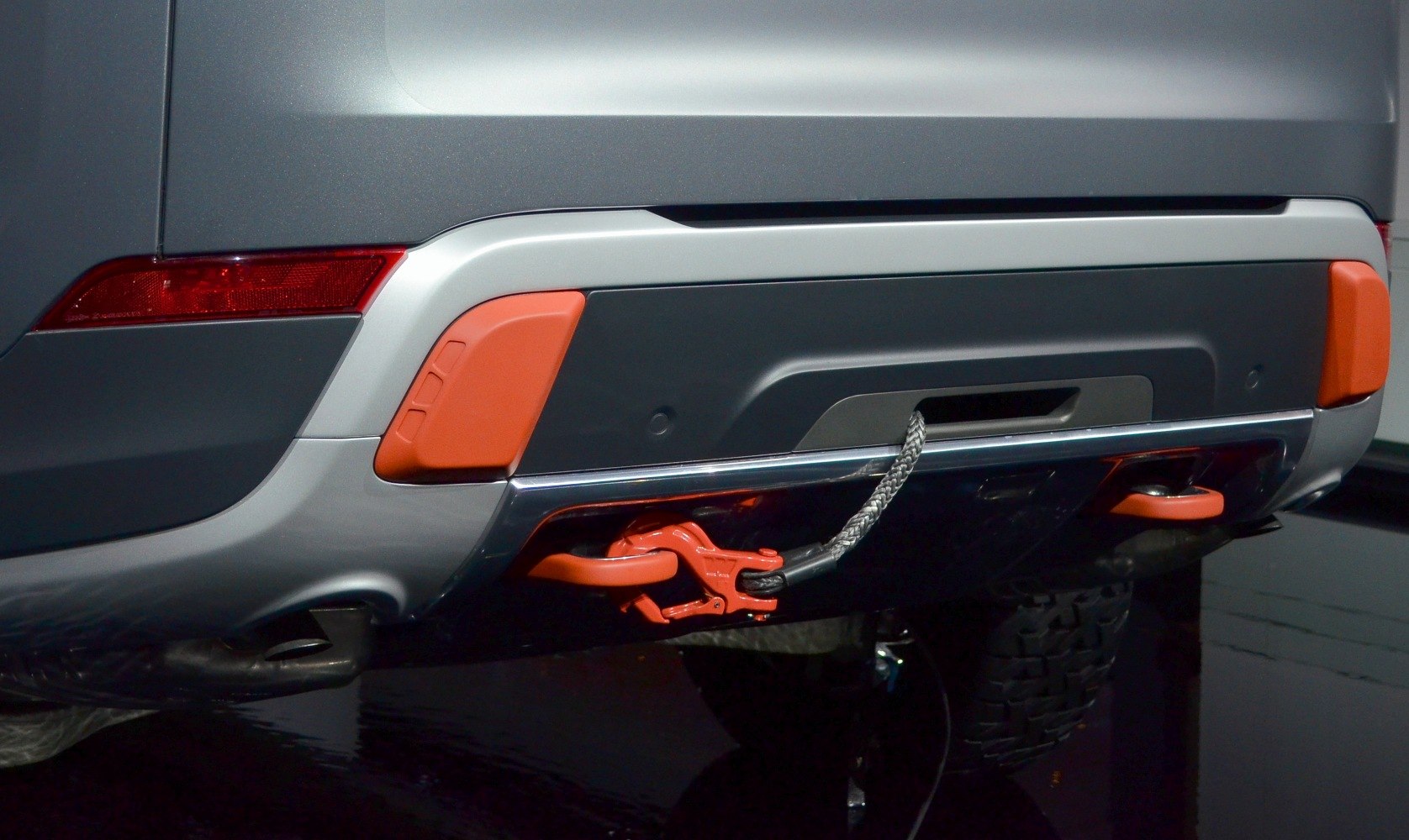 Rear bumper with orange tow hooks and attached rope