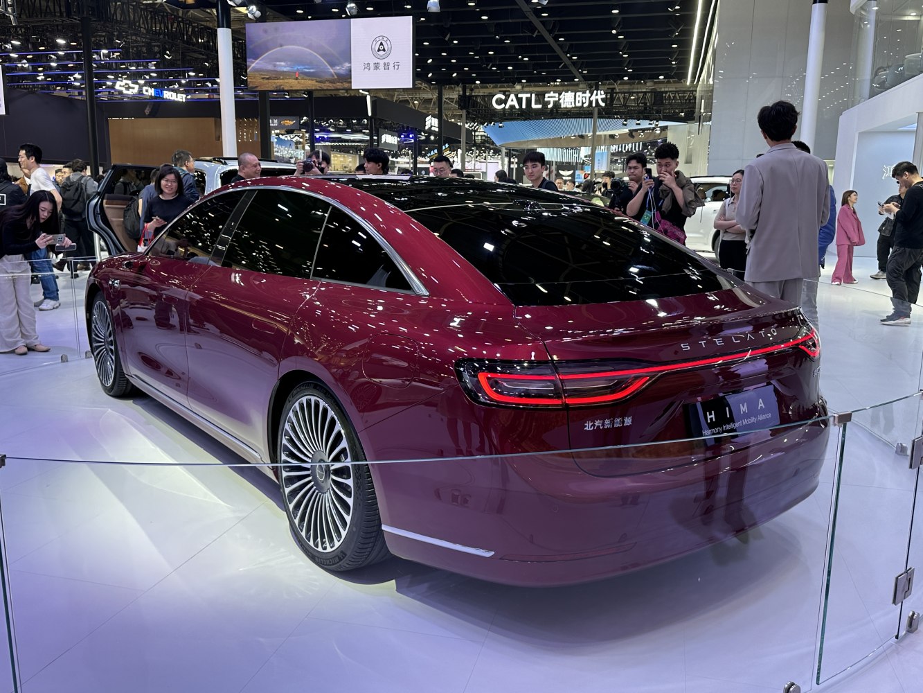Luxury sedan rear with LED continuous taillights and aerodynamic roofline