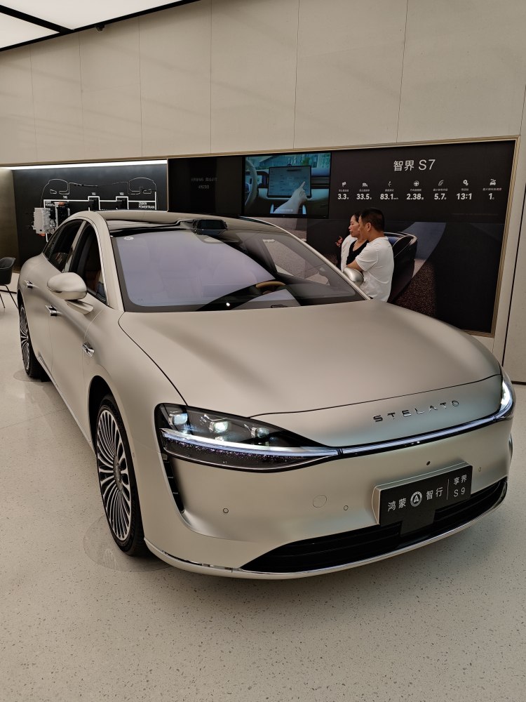 Front view with sleek LED headlights and aerodynamic smooth body.