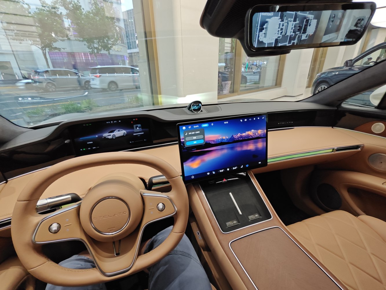 Digital dashboard and large infotainment touchscreen in luxury beige interior