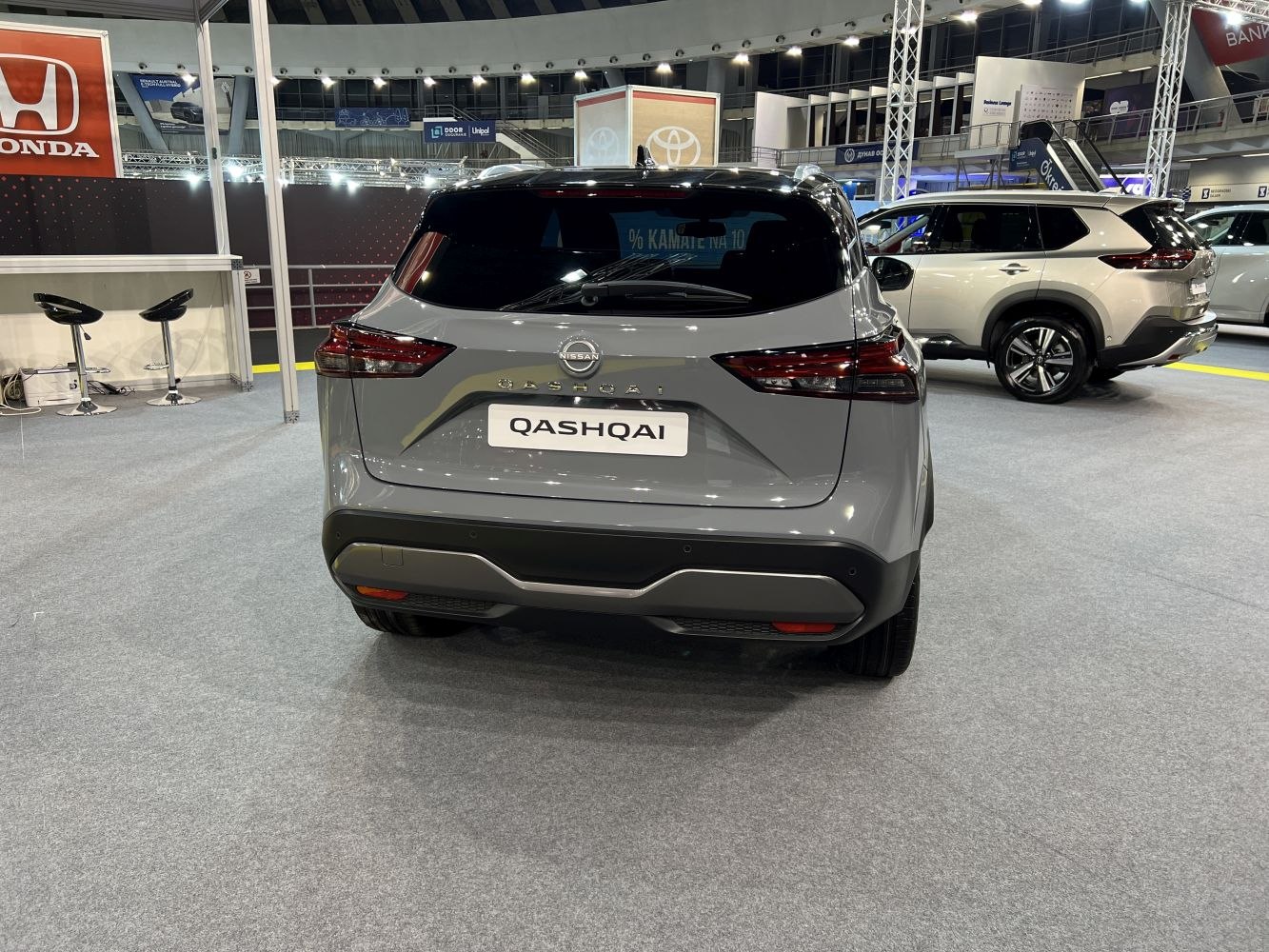 Rear view of SUV with modern taillights and rear bumper.