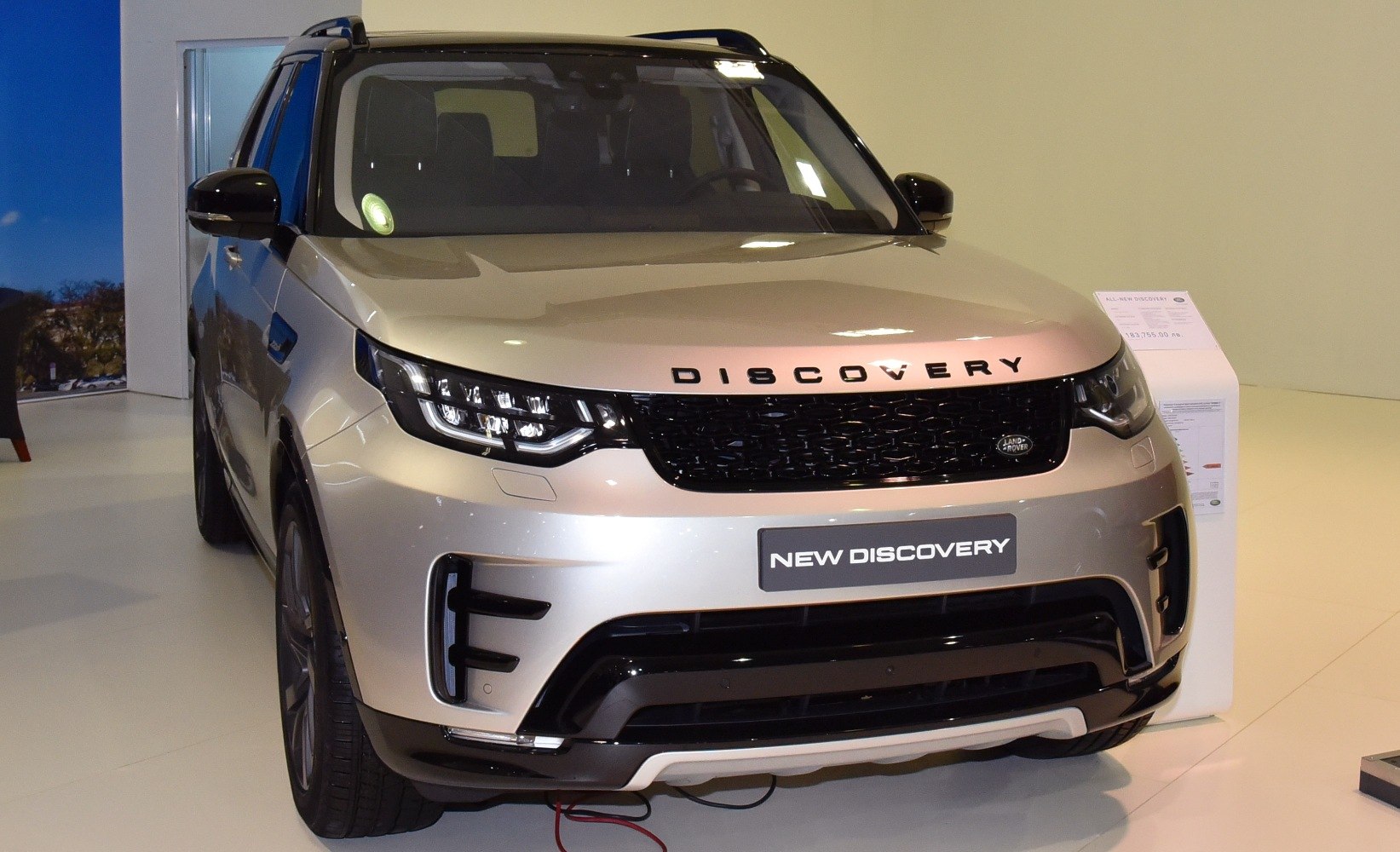 LED headlights and bold grille design on modern SUV front fascia