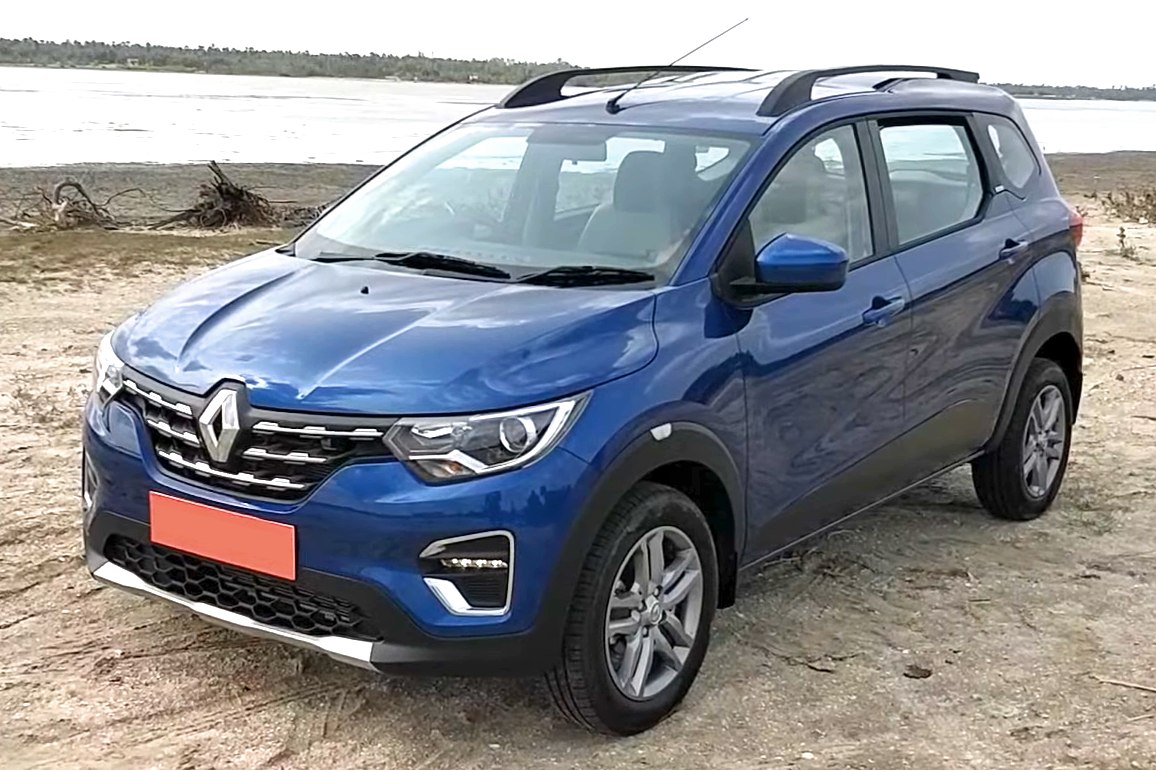 Blue SUV front angled view with grille and roof rails