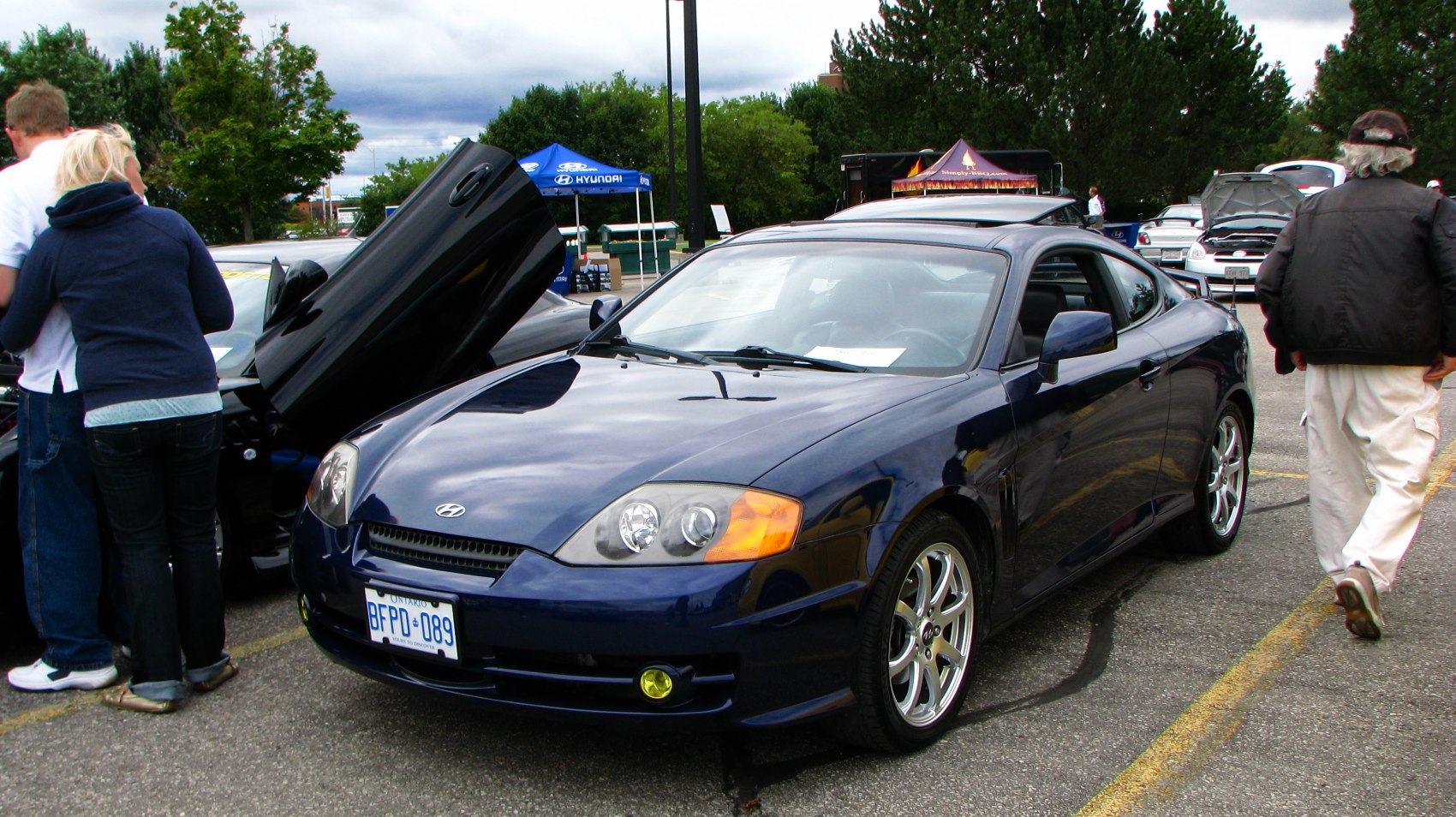 Sport coupe front and side view with alloy wheels