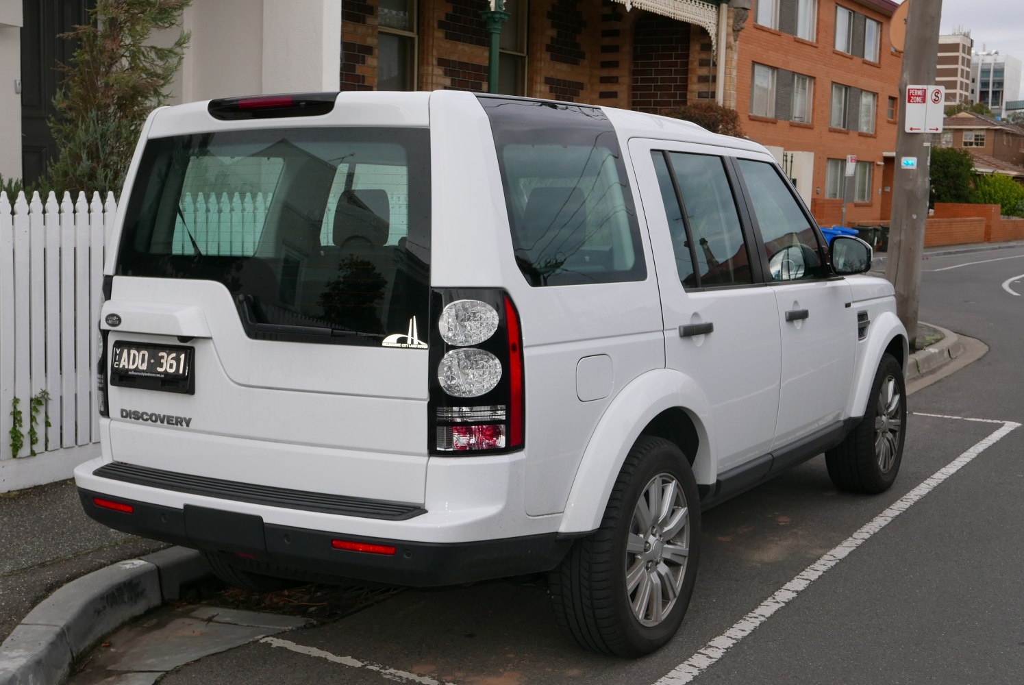 Rear view of SUV with distinct tail lights and split rear window.